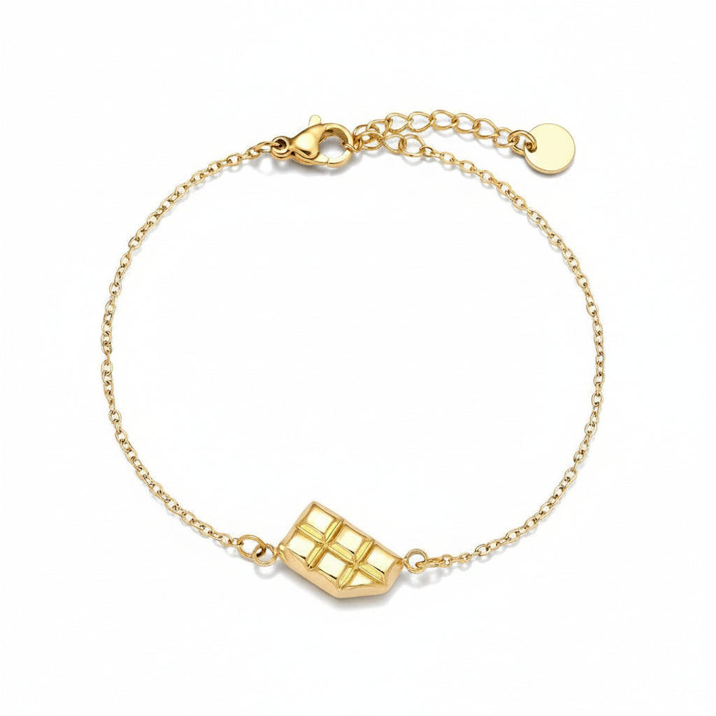 Gold bitten chocolate bar charm bracelet on delicate chain with playful design
