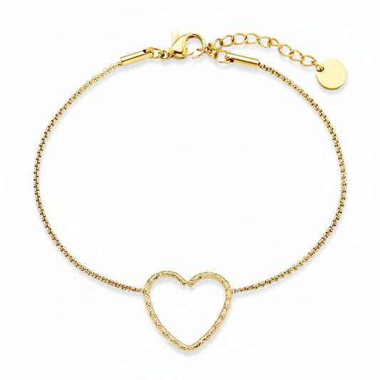 Gold twisted heart bracelet with rope-textured heart charm on delicate box chain