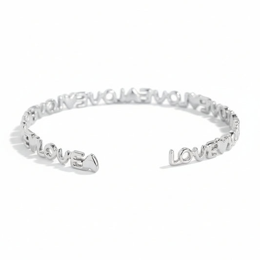 White gold-plated adjustable cuff bangle with repeated LOVE script