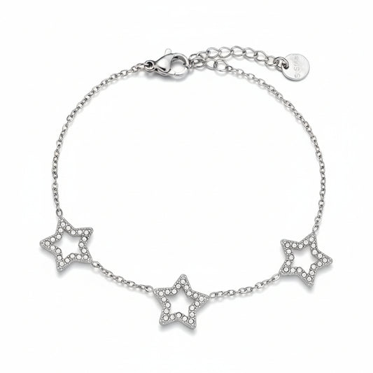 Silver star bracelet on a white background