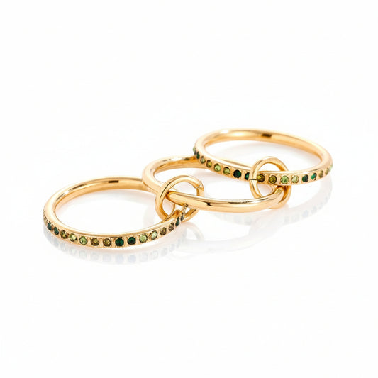 gold triple-band linked ring with green gradient zircon stones