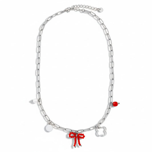 White gold-plated stainless steel paperclip chain necklace with curated charms including red beaded bow, quatrefoil, freshwater pearl, polished disc, and red crystal – ogrlica