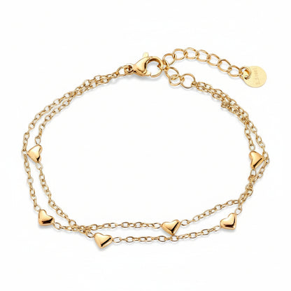 Gold-plated double-layered bracelet with delicate heart charms on two fine chains