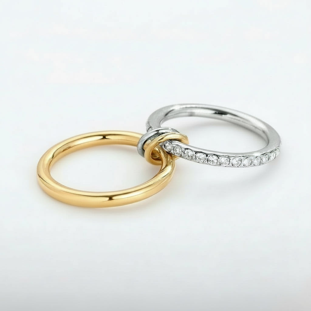 Dual Harmony Ring with linked gold and silver bands and zircon details