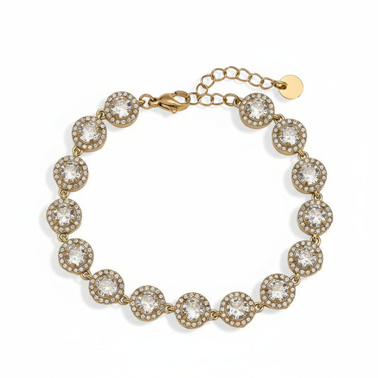 Gold halo crystal bracelet with pavé-set stones in bezel settings on white background