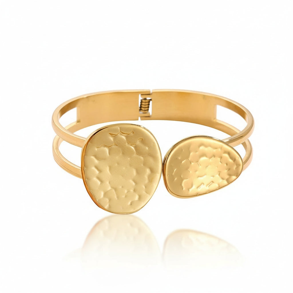 Gold-plated hammered bangle with two textured disc details on double-band frame