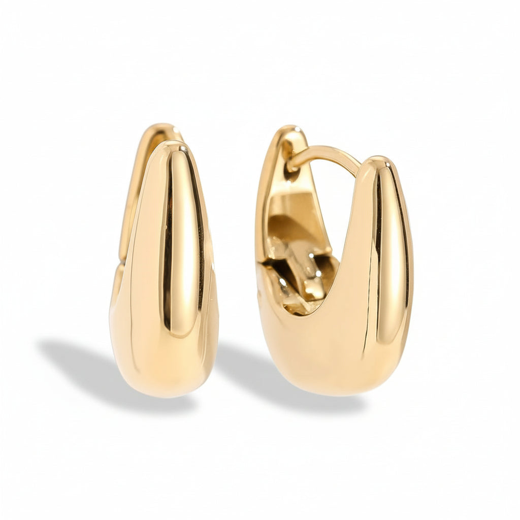 Gold-plated stainless steel chunky teardrop hoop earrings with smooth sculptural design – naušnice.