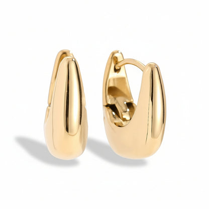 Gold-plated stainless steel chunky teardrop hoop earrings with smooth sculptural design – naušnice.