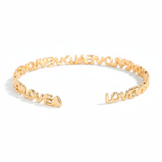 Gold-plated adjustable cuff bangle with repeated LOVE script