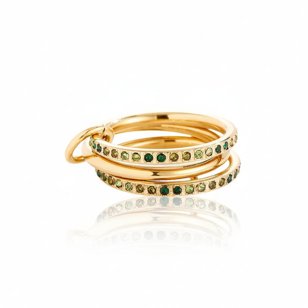 gold triple-band linked ring with green gradient zircon stones