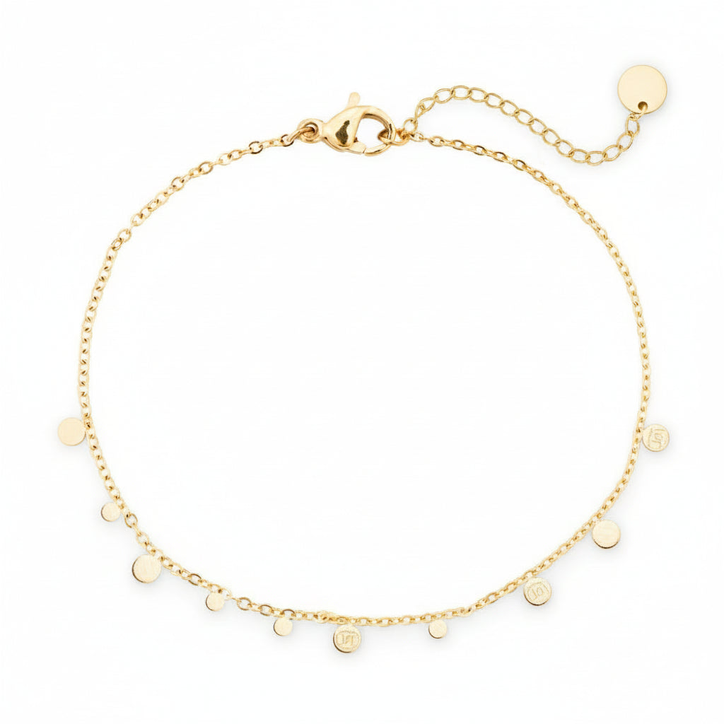 Gold delicate chain bracelet with small disc charms inspired by moon phases