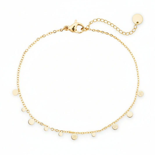 Gold delicate chain bracelet with small disc charms inspired by moon phases