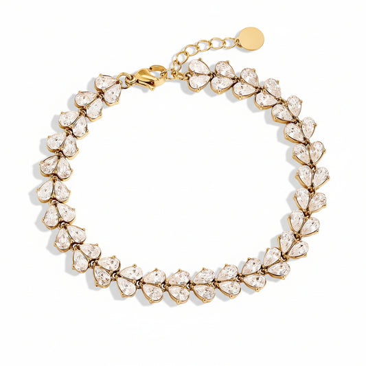 Gold bracelet with pear-cut cubic zirconia stones forming continuous