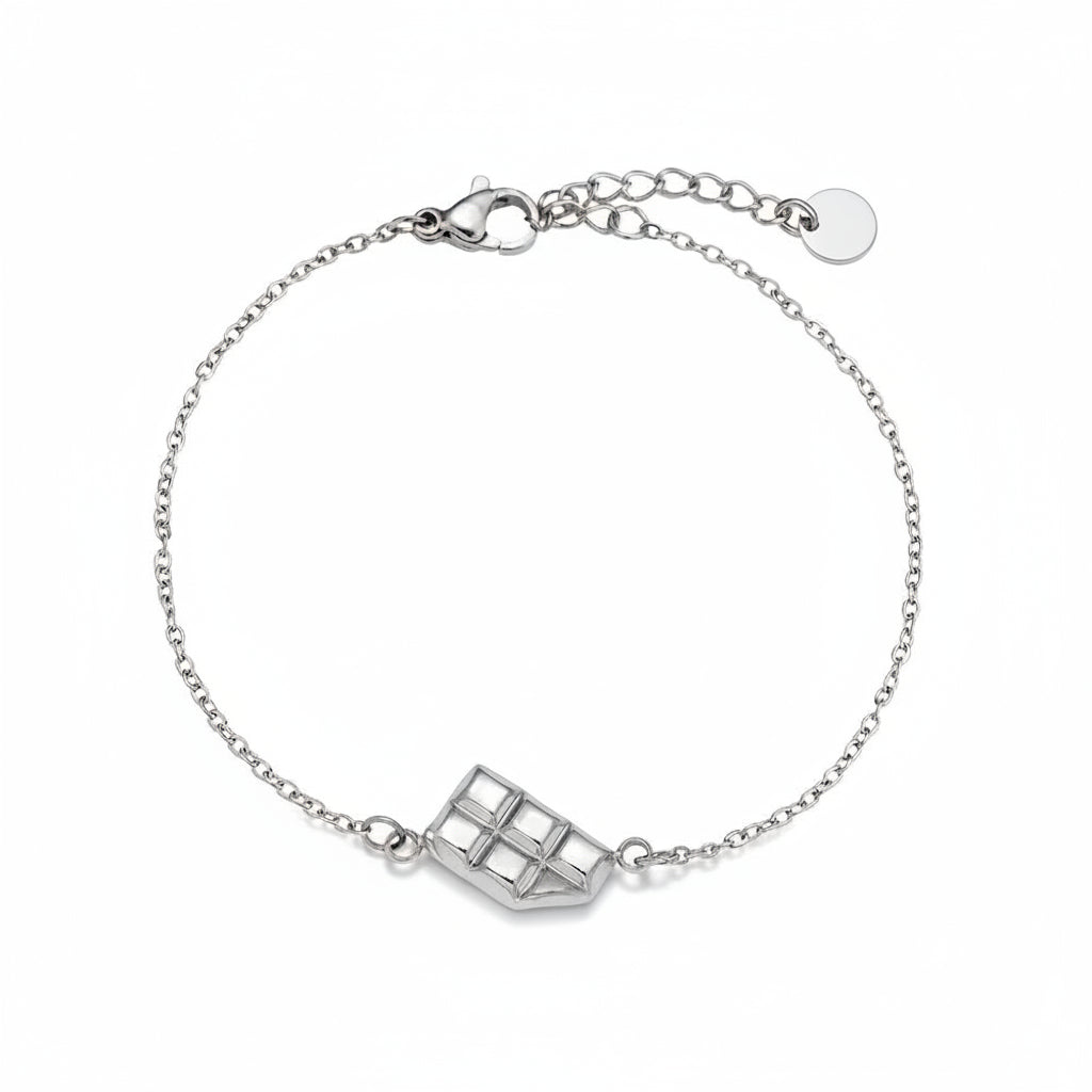 Silver bitten chocolate bar charm bracelet on delicate chain with playful design