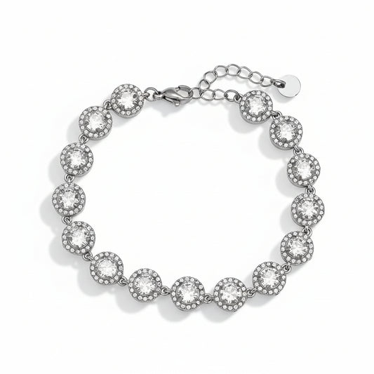 Silver halo crystal bracelet with pavé-set stones in bezel settings on white background