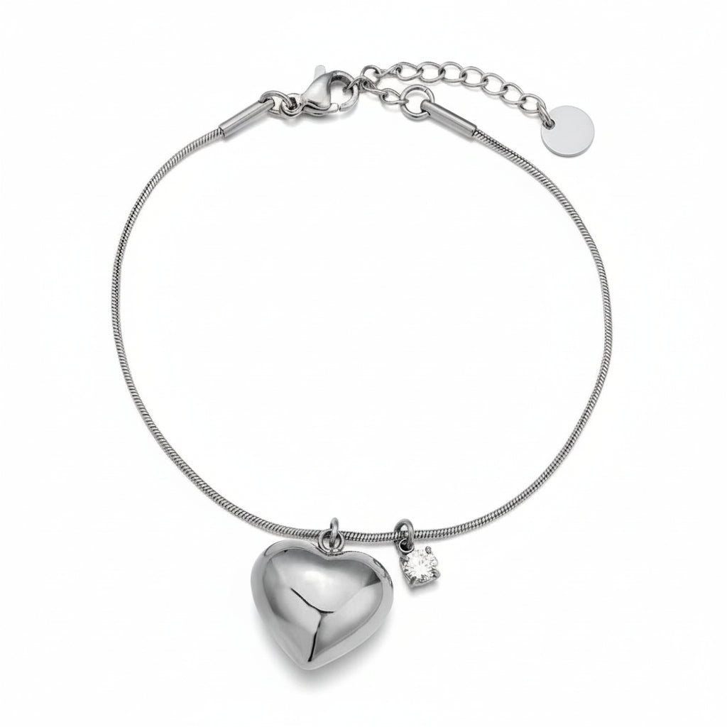 Silver puffed heart charm bracelet with crystal accent on delicate snake chain
