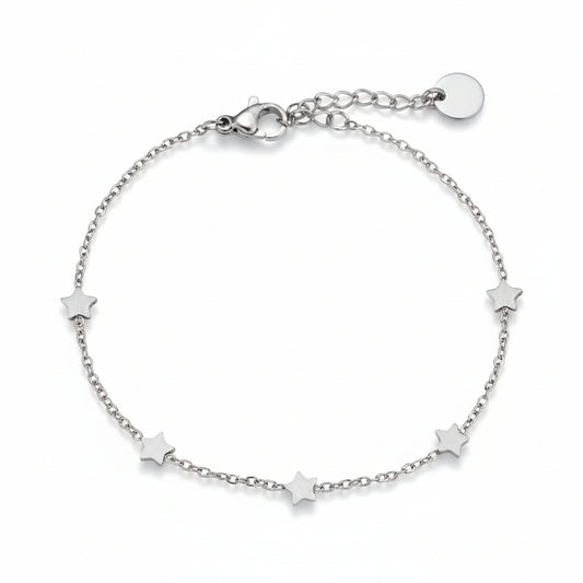 Silver scattered star bracelet with five celestial charms on delicate chain
