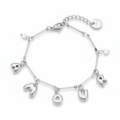 Silver AMOUR letter charm bracelet with freshwater pearl accents on delicate chain