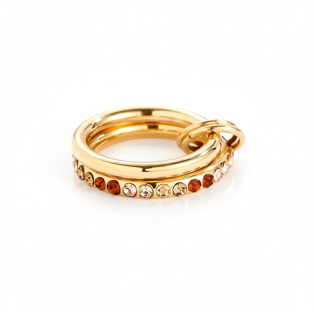 Sunset Gradient Link Ring with two linked gold bands and warm amber-gradient zircon stones.
