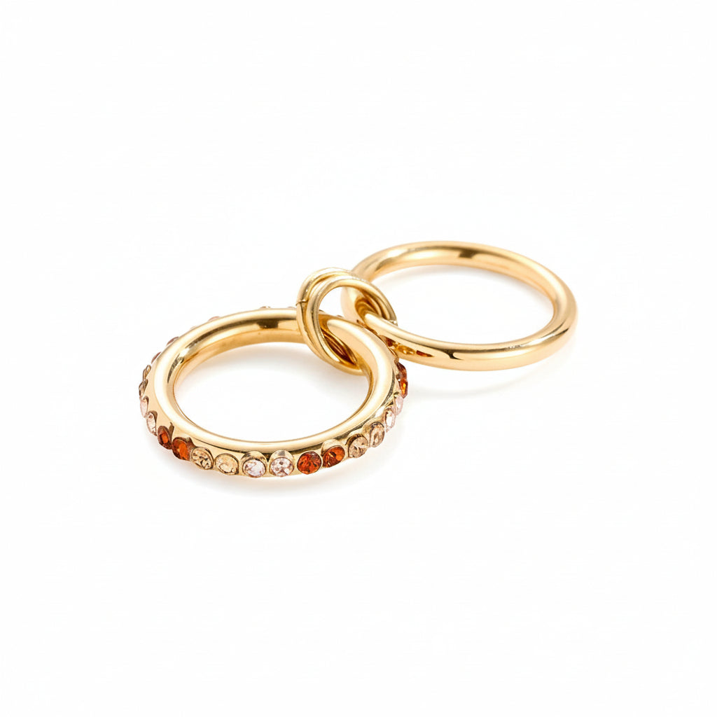 Sunset Gradient Link Ring with two linked gold bands and warm amber-gradient zircon stones.