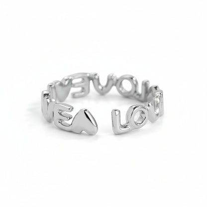 Adjustable stainless steel ring with sculptural LOVE lettering